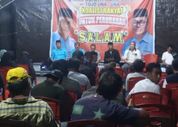 Paslon SALAM saat melakukan kampanye di Kec. Ratolindo. [ foto : Usman Ayahu ]