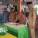 Foto : Penadatangan Berita Acara Sertijab oleh Camat Ampana Tete Abd. Wahid, S.Pd.I, Selasa (16/12/2025).
