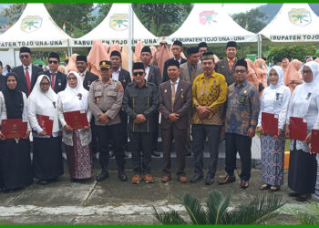 Bupati Tojo Una-Una Ilham Lawidu, S.H., pada Upacara Peringatan HAB ke-80 Kemenag RI di halaman Kantor Kementerian Agama Kabupaten Tojo Una-Una, Sabtu (3/1/2026).