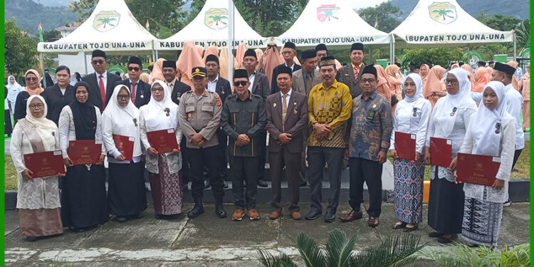 Bupati Tojo Una-Una Ilham Lawidu, S.H., pada Upacara Peringatan HAB ke-80 Kemenag RI di halaman Kantor Kementerian Agama Kabupaten Tojo Una-Una, Sabtu (3/1/2026).