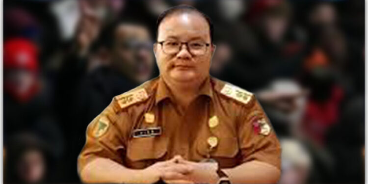 Kepala Dinas Kesehatan, Pengendalian Penduduk dan KB Kabupaten Tojo Una-Una, Dr. Niko, S.Ked., M.K.M., M.M., M.H.