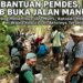 “Puluhan petani cengkih di Desa Dolong B, Kecamatan Walea Kepulauan, Kabupaten Tojo Una-Una, Sulawesi Tengah, tengah bergotong royong membuka jalan kantong produksi Topikan Jaya sepanjang tiga kilometer secara manual” Foto: Istimewa